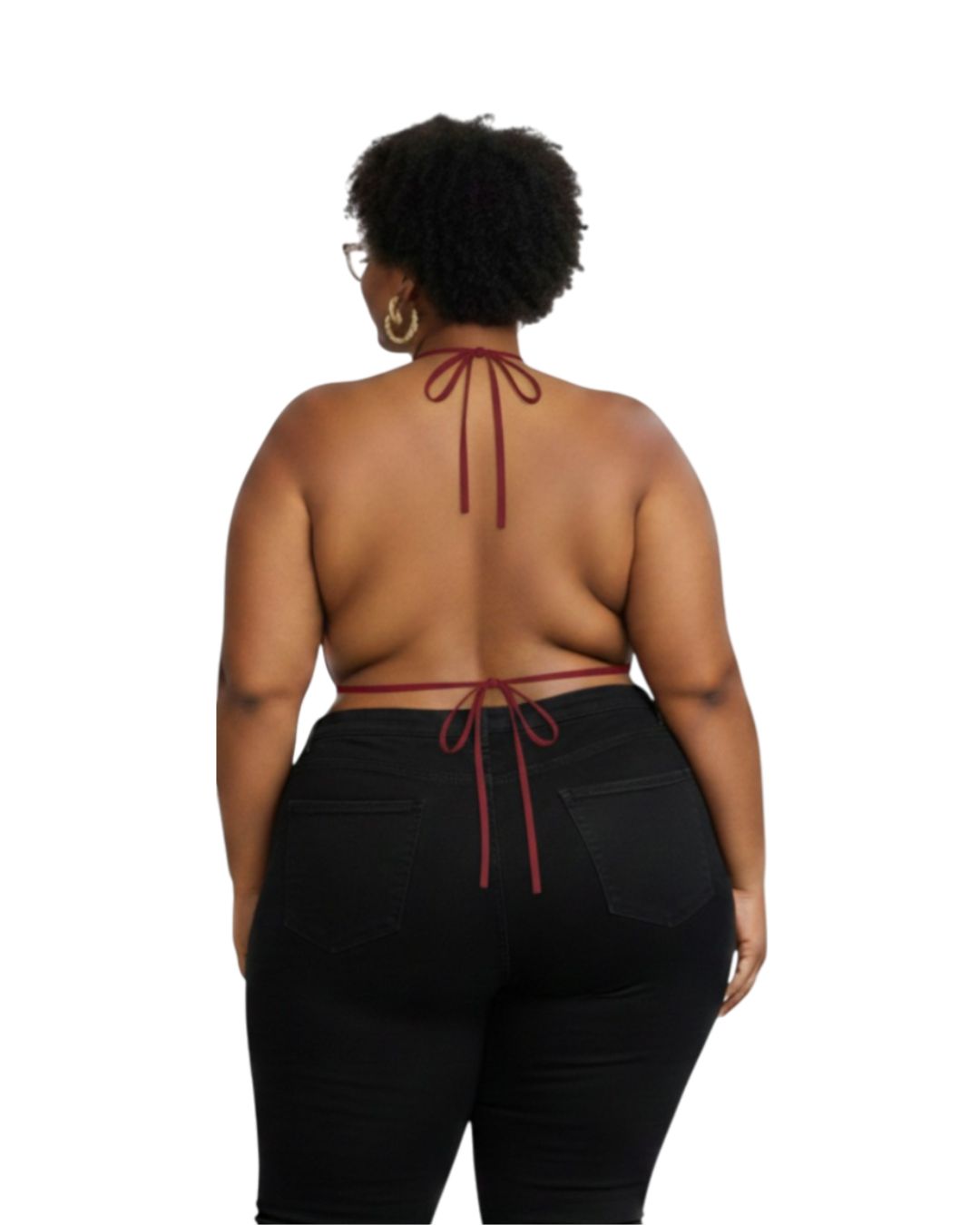 Person wearing a halter top with red straps and black pants on a white background